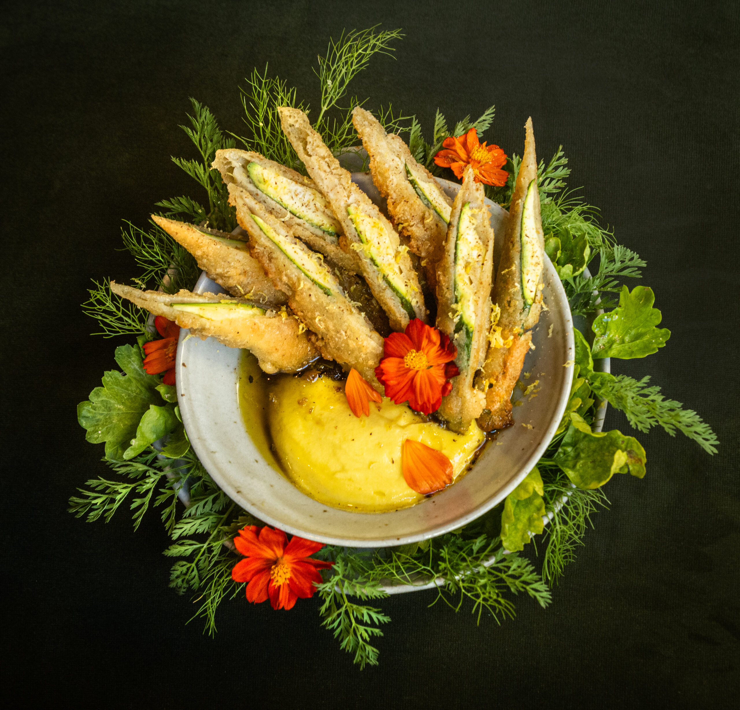 Farm Summer Squash with golden glory puree, oven fried zucchini, charred scallion, lemon, gochujang and nutmeg from Little Saint in Healdsburg. (John Burgess/The Press Democrat)