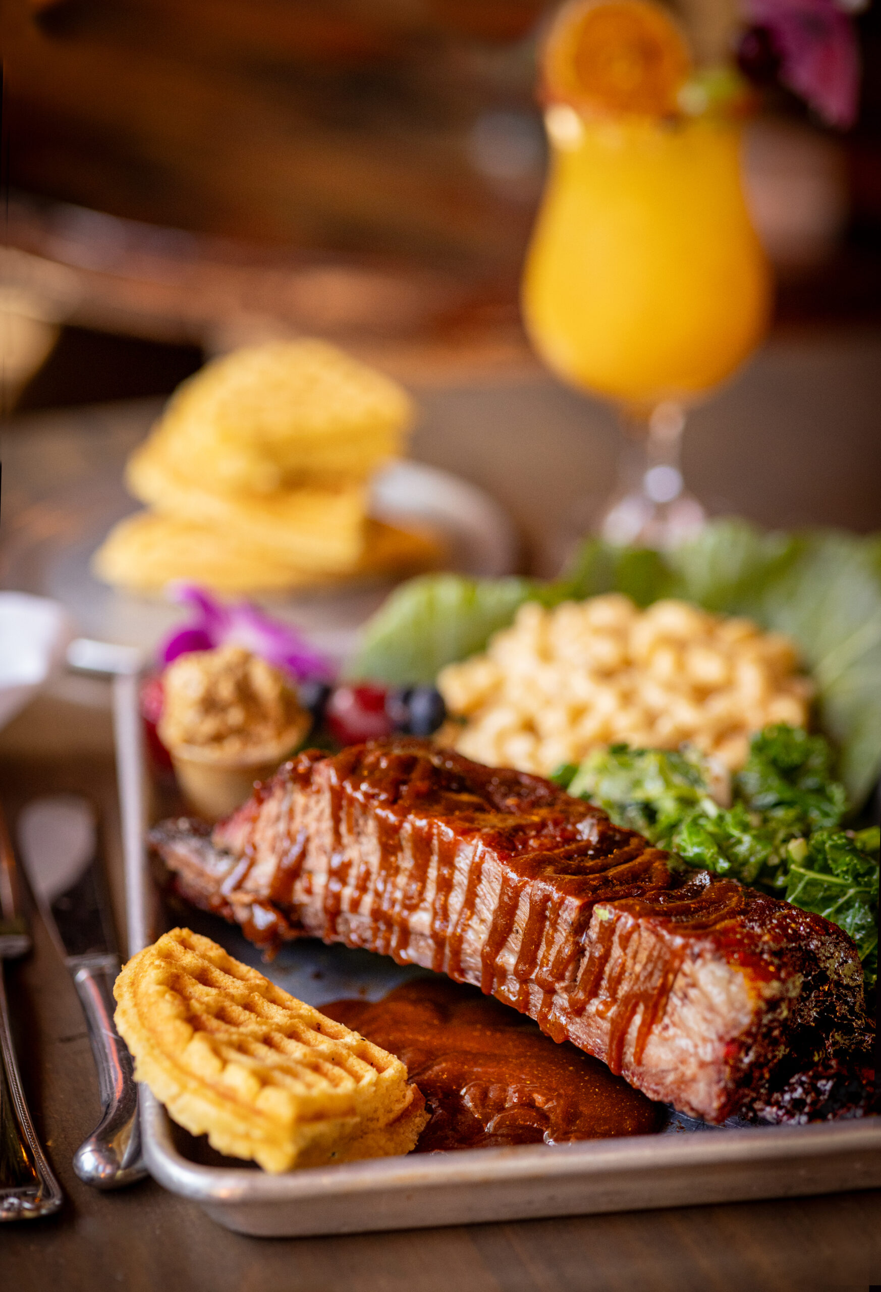 Beef Ribs with mac and cheese and cornbread waffles with crack butter from Saucy Mama’s Jook Joint 