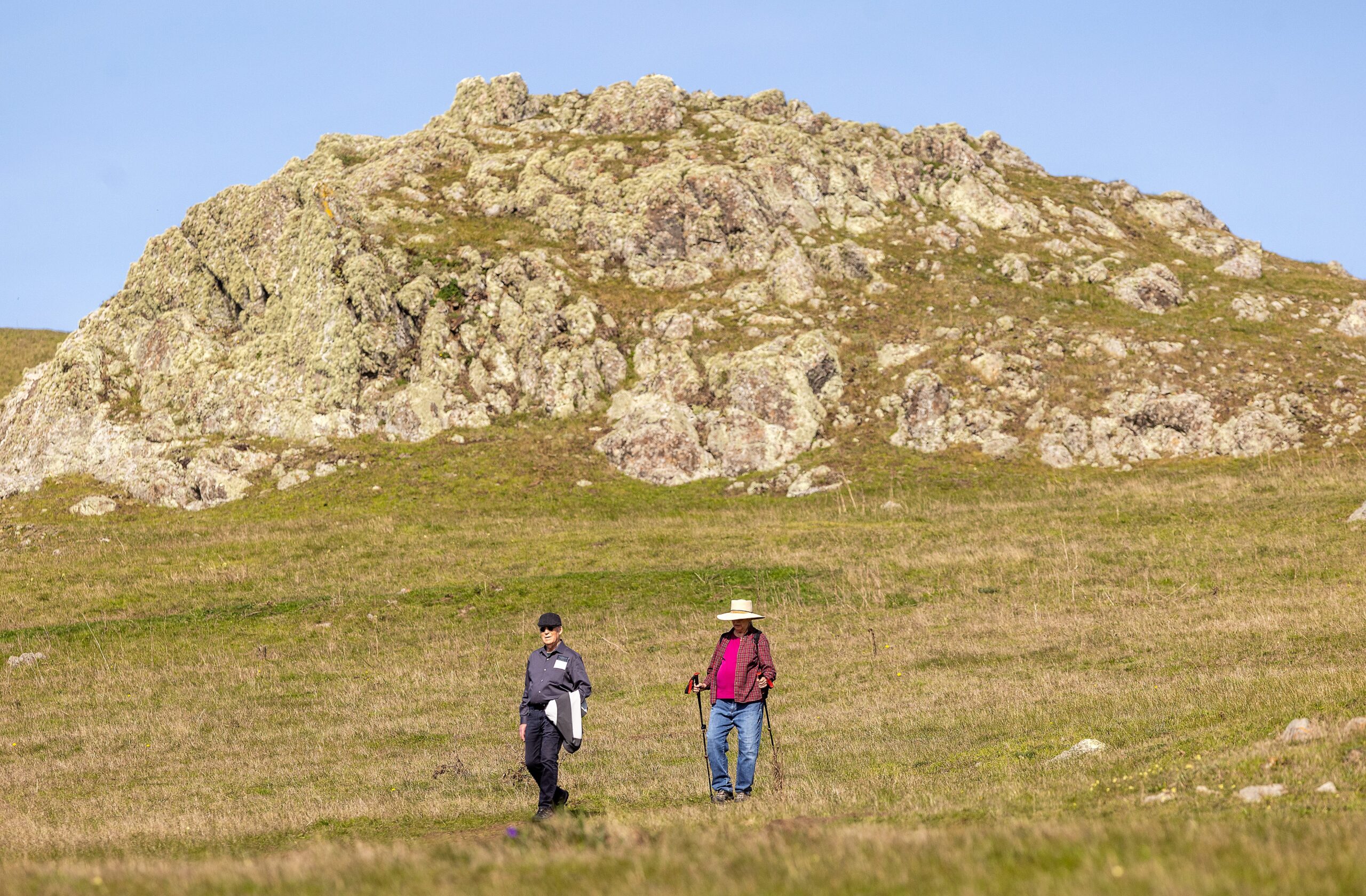 Hikers Jeffrey Hallack and Deborah Symes hike back to the trailhead of the recently opened Estero Americano Coastal Preserve Friday Jan 30, 2026 in Bodega Bay. (John Burgess / The Press Democrat)