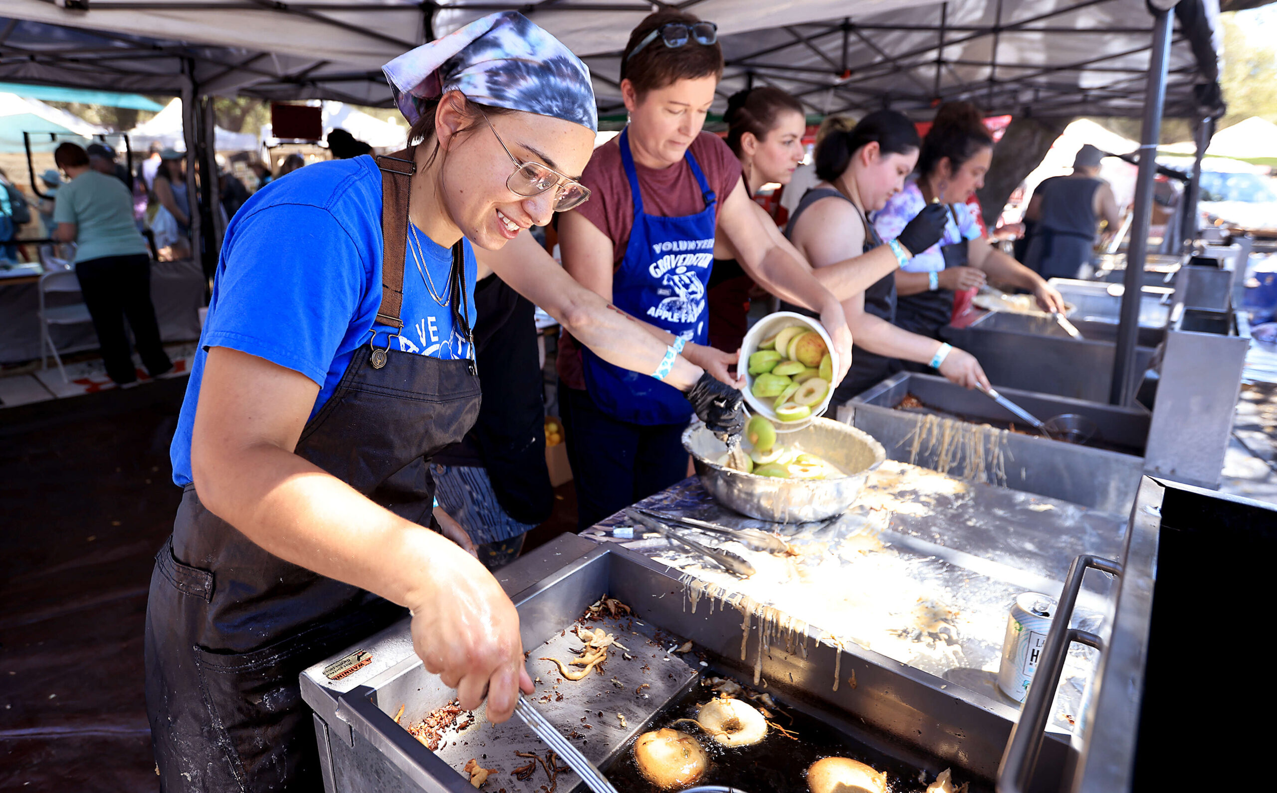 Making apple fritters at the Gravenstein Apple Fair in Sebastopol