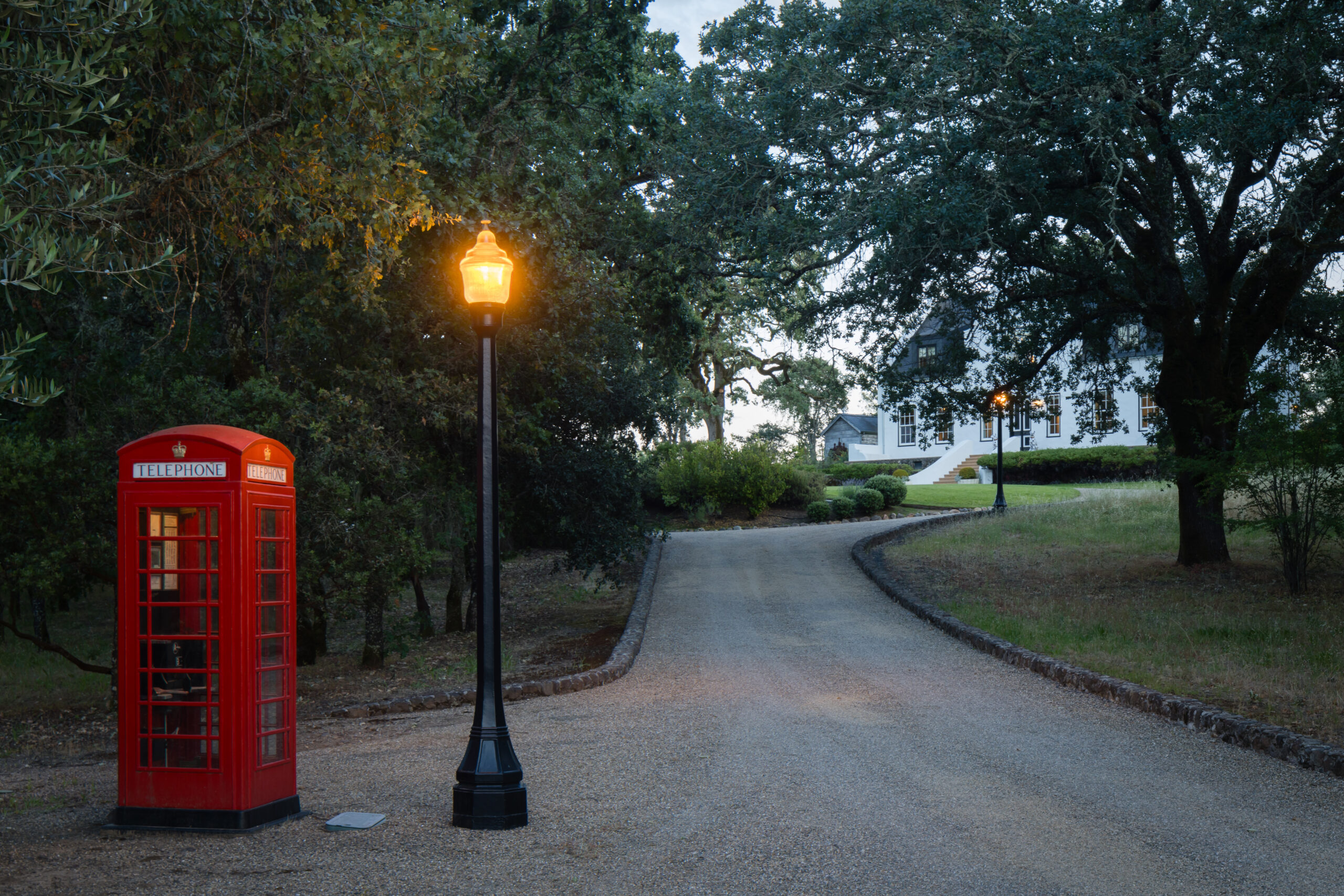 Phone booth and reclaimed vintage steetlamps on the grounds. (Peter Lyons)