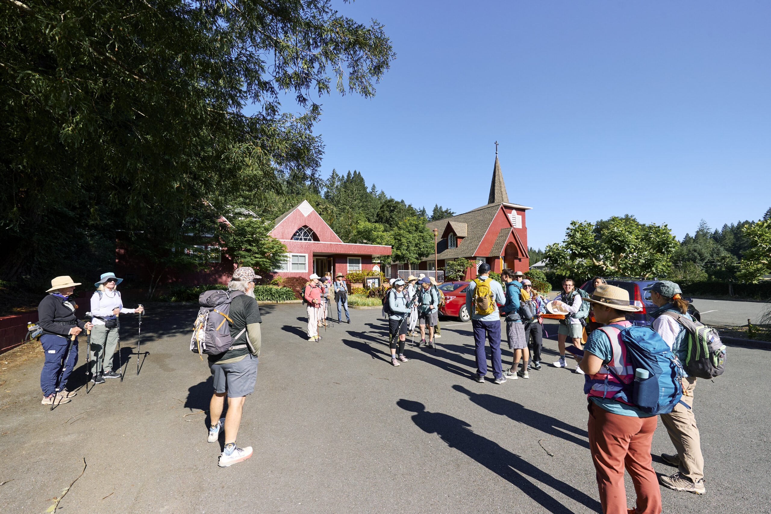 Camino de Sonoma hikers meet at St. Philip the Apostle church in Occidental to begin Stage 5, a route that takes them through redwoods and open fields with views of the coast, their destination for the day. (Kim Carroll)