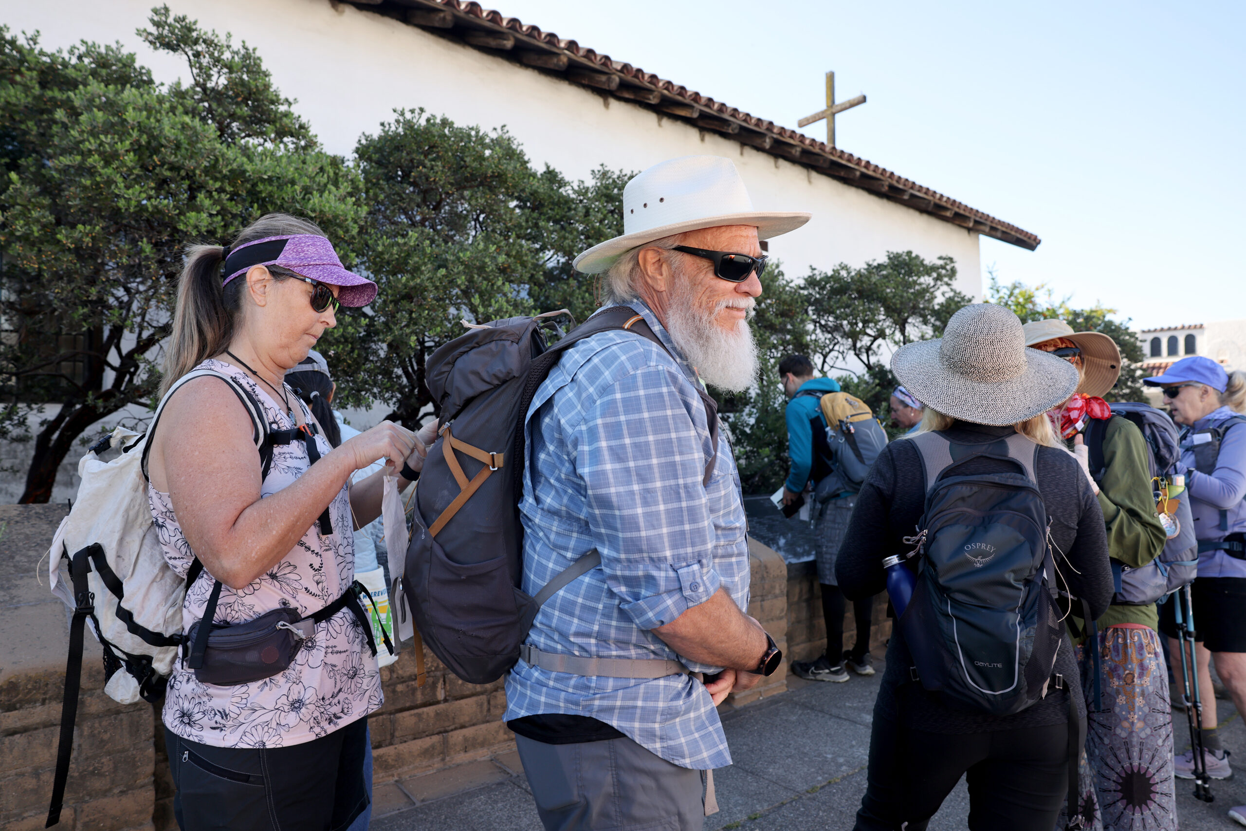 People prepare to hike the Camino de Sonoma