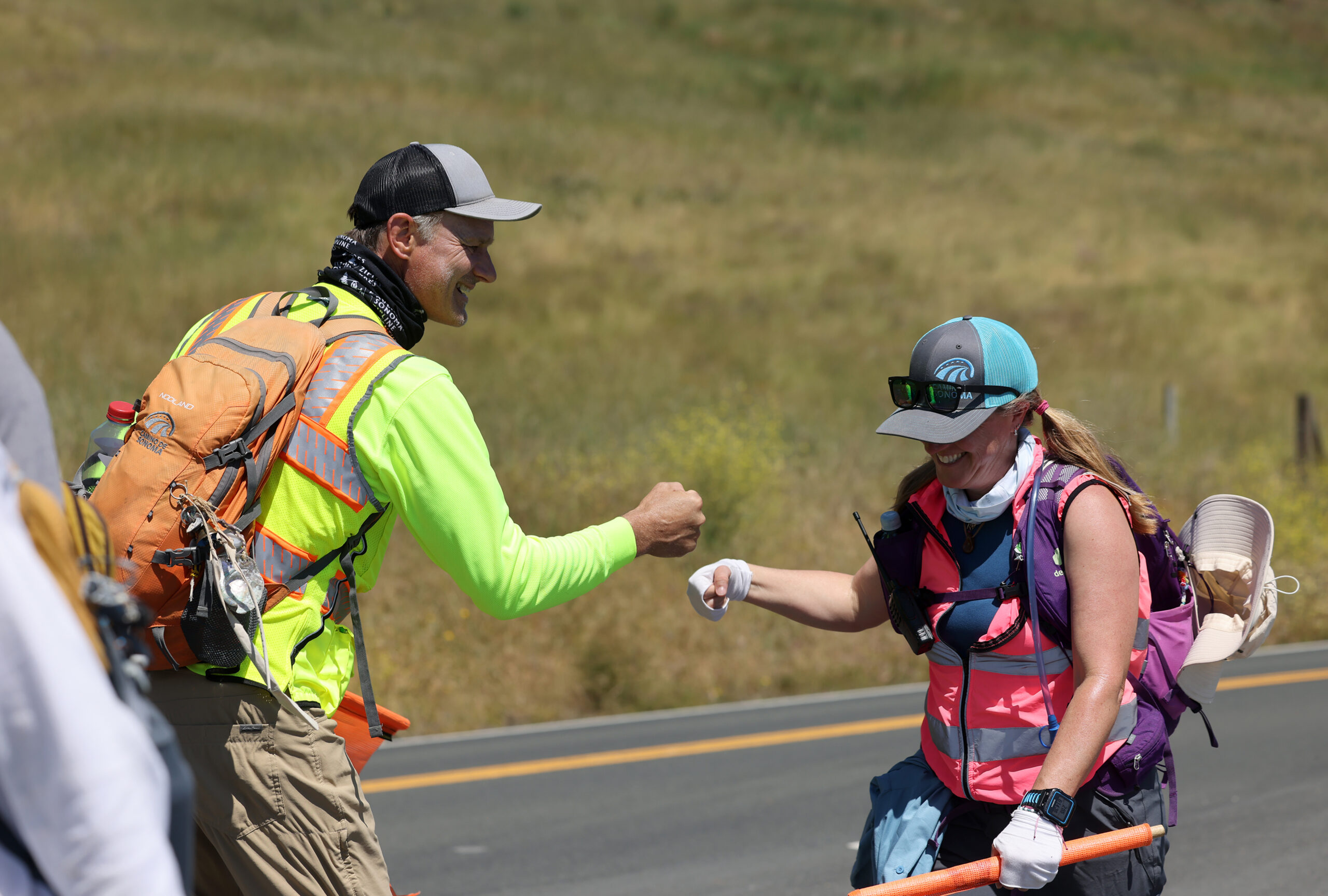 Tony "Camino" McCormick gives encouragement to a hiker