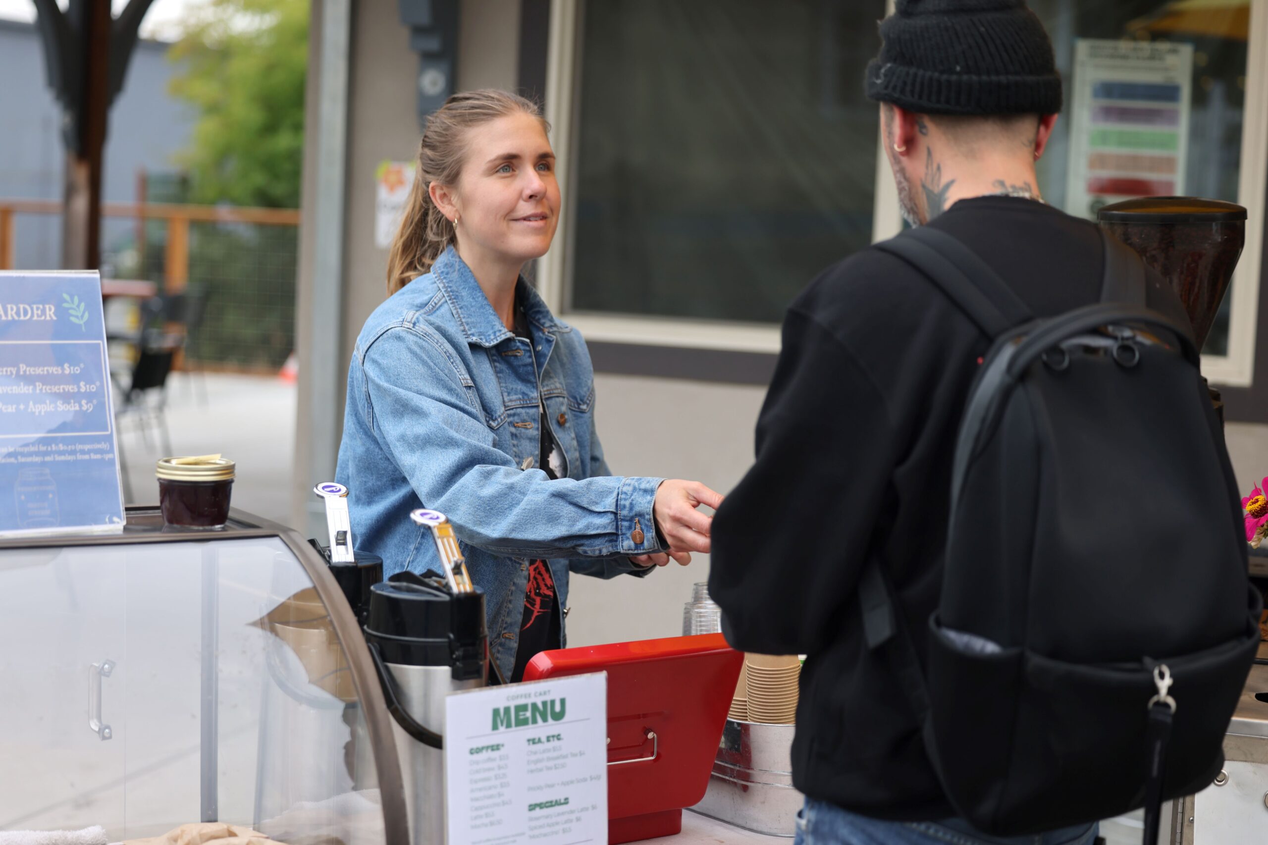 Ferrell Carter rings up a customer buying coffee at the Graton Station in Graton Sunday, Aug. 16, 2026. (Beth Schlanker / The Press Democrat)