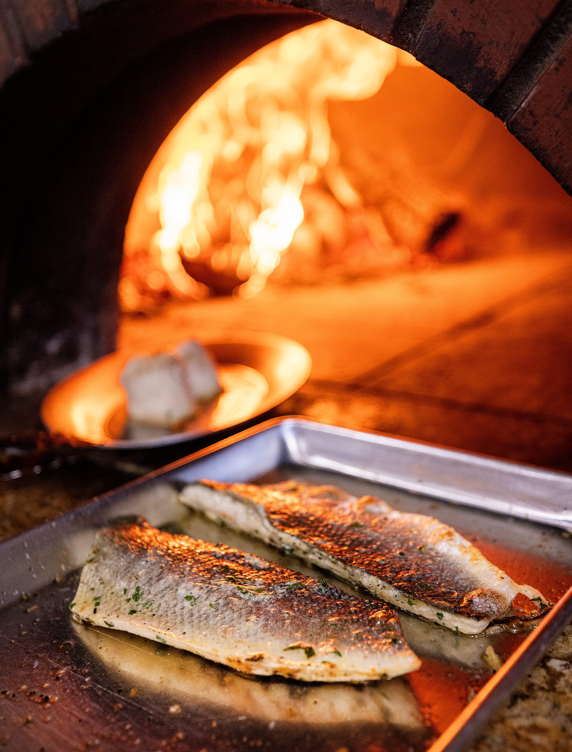 Wood-fired petrale sole for the daily special at Capriciano Osteria