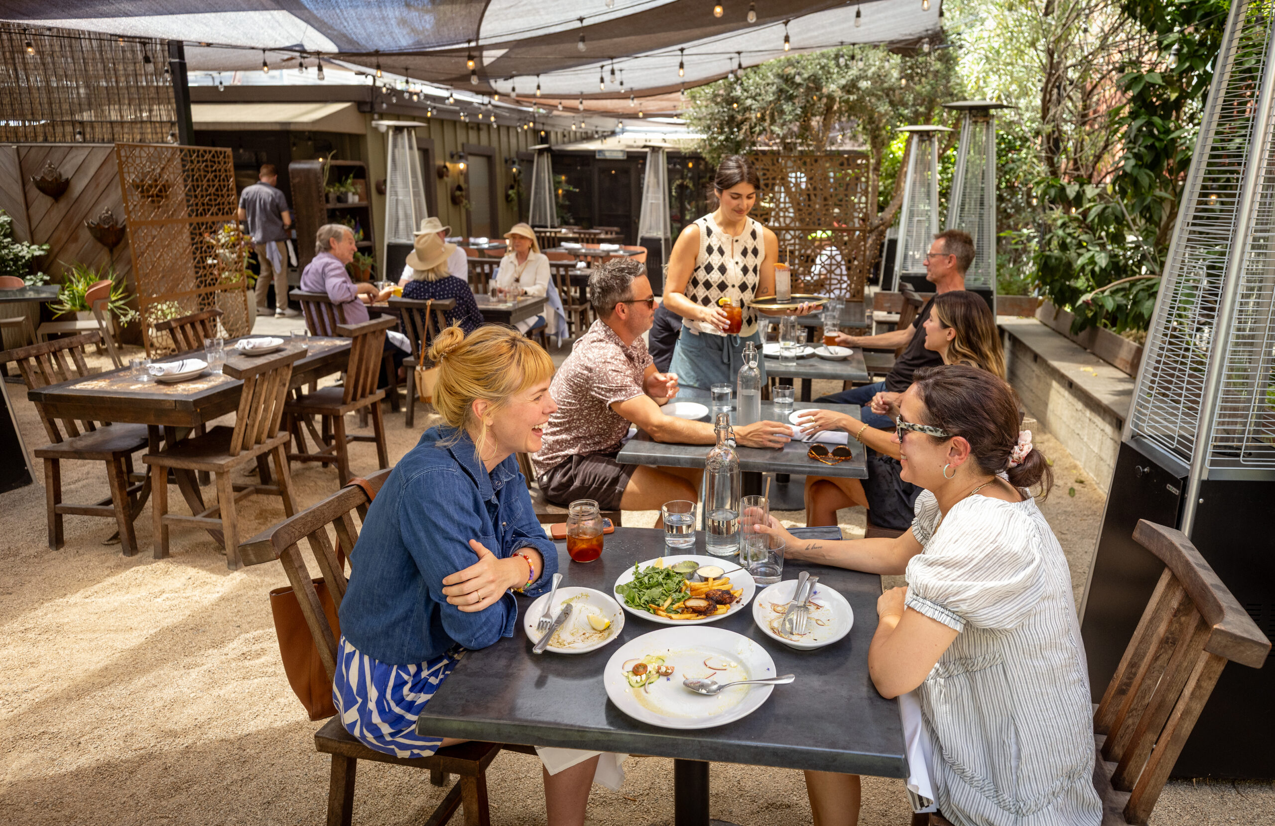 The outdoor patio seating at Lo & Behold Monday, Aug. 3, 2026 in Healdsburg. (John Burgess/The Press Democrat)