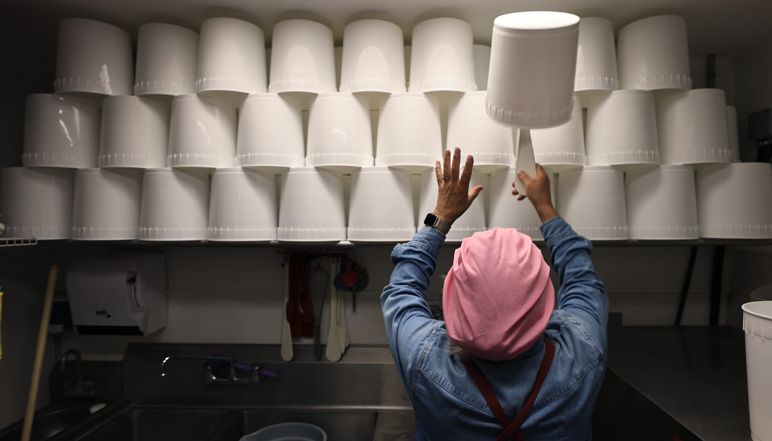 Screamin' Mimi’s Maraline “Mimi” Mazzetti Olson pulls down a bucket which will store a batch of Cookie Break, Wednesday, August 12, 2026, in Sebastopol. (Kent Porter / The Press Democrat)