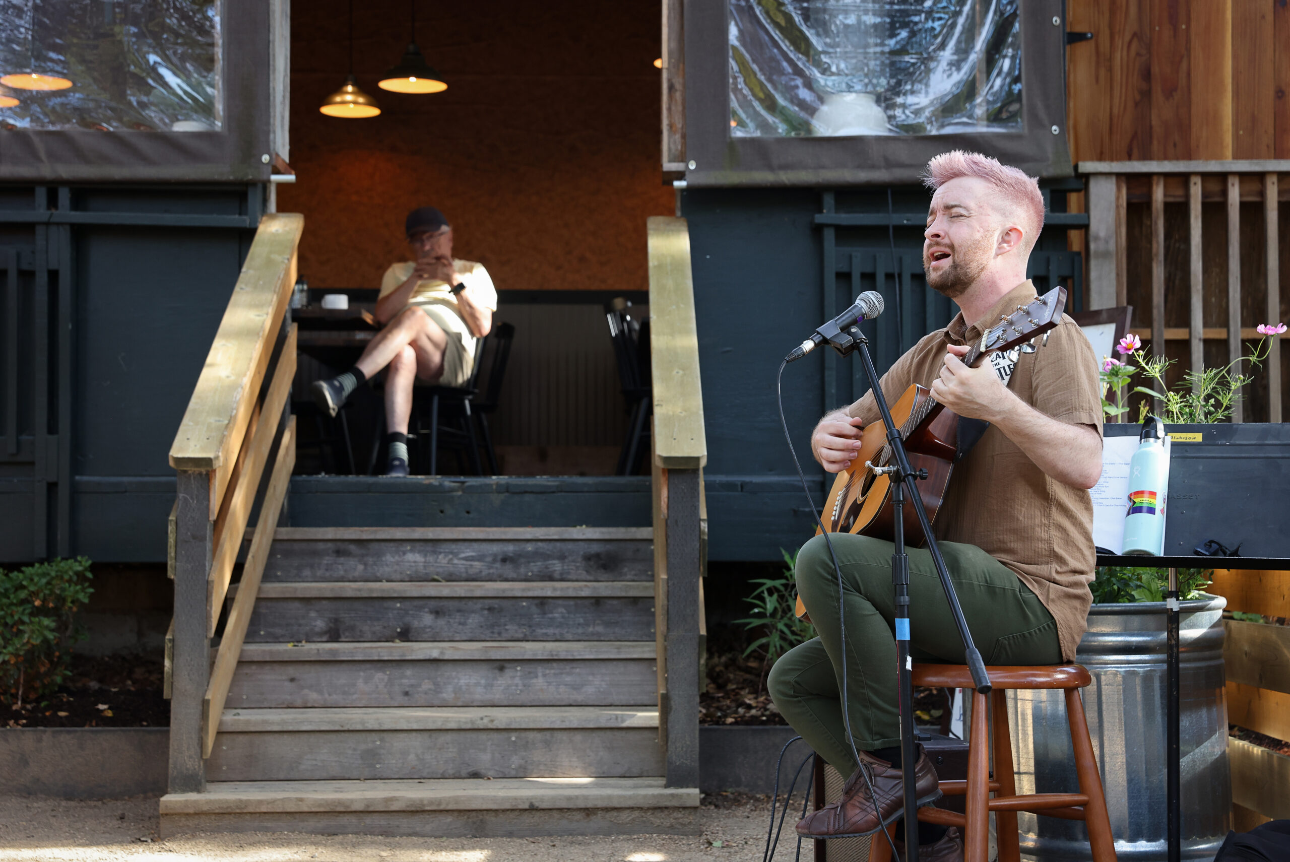 Patrick Atchison performs at The Porch Kitchen’s outdoor dining area in Sebastopol on Thursday, August 20, 2026. (Christopher Chung/The Press Democrat)