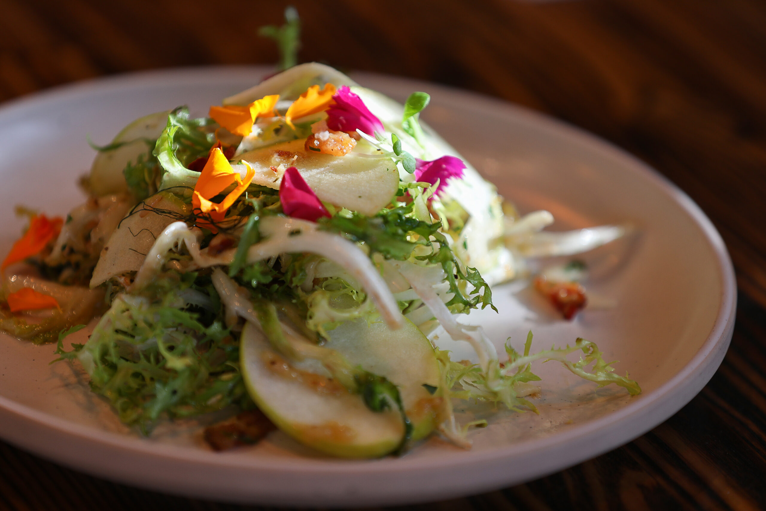 The Salade Lyonnaise served at The Porch Kitchen in Sebastopol on Thursday, August 20, 2026. (Christopher Chung/The Press Democrat)