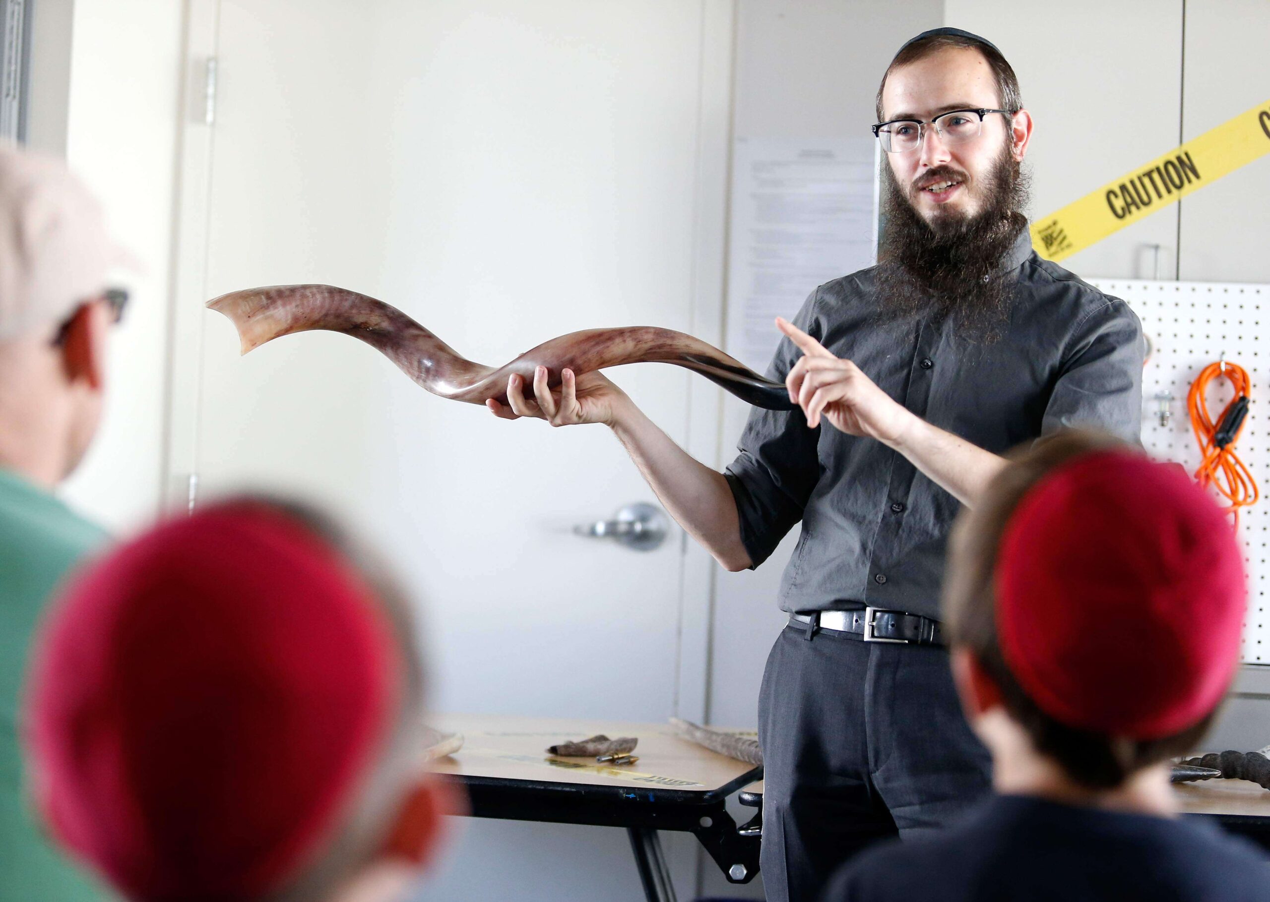 Rabbi Dovid Bush, of the Chabad Jewish Center of Petaluma, teaches a pre-Rosh Hashanah shofar making workshop